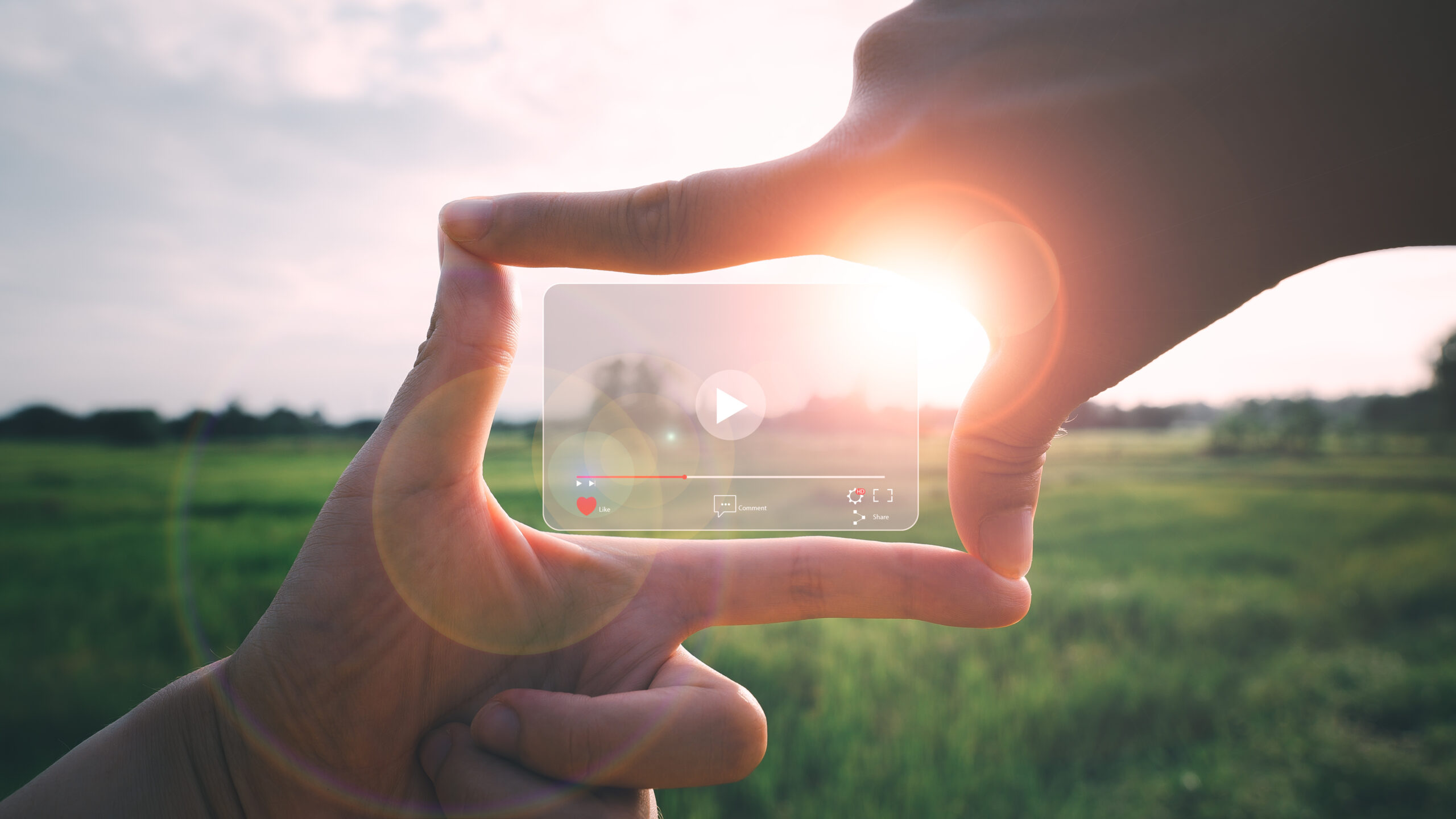 Online live streaming video marketing concept, Photo sign made by human hands on nature blurred sunset sky as background